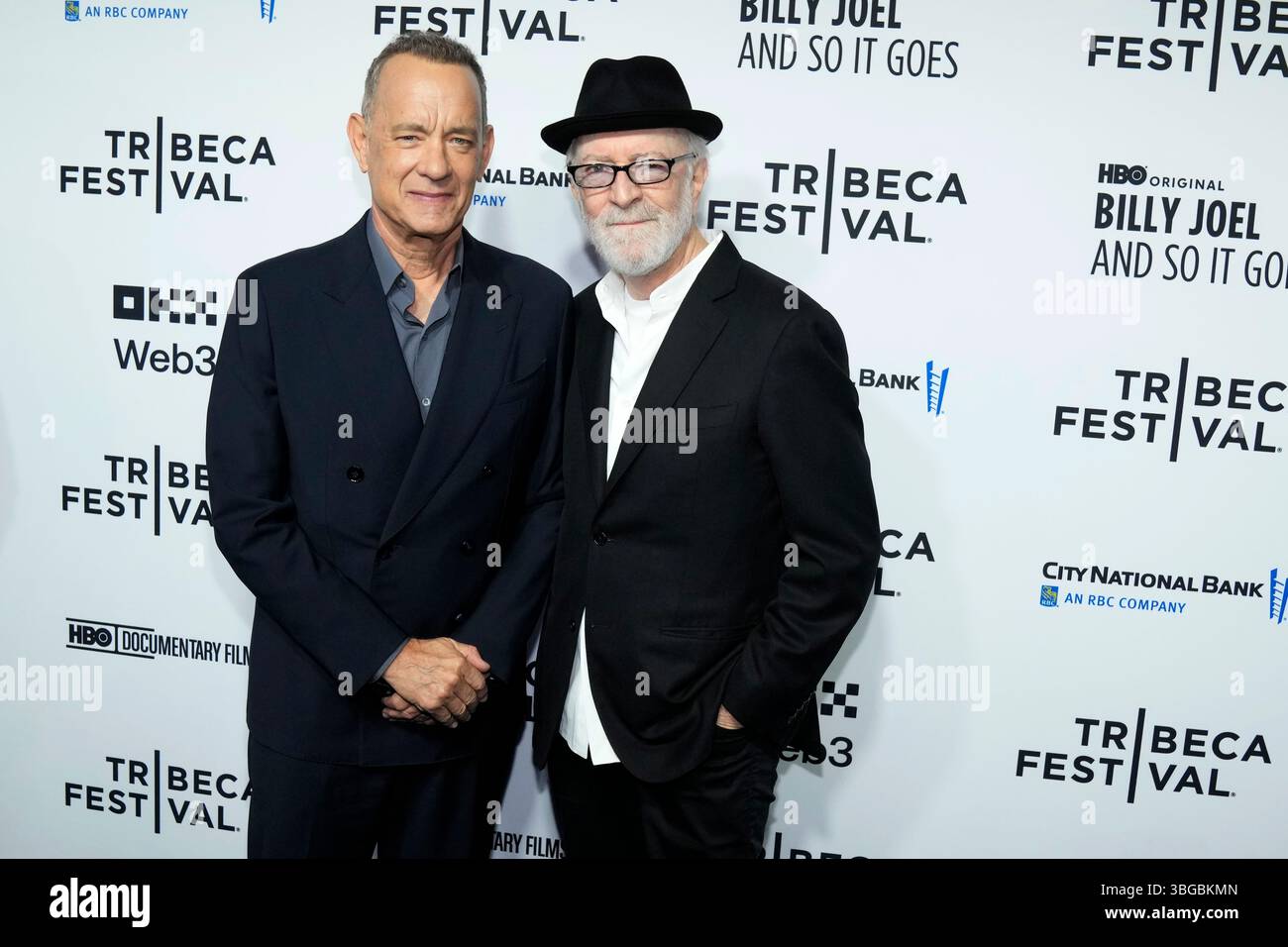 Tom Hanks, left, and Gary Goetzman attend the Tribeca Festival opening ...