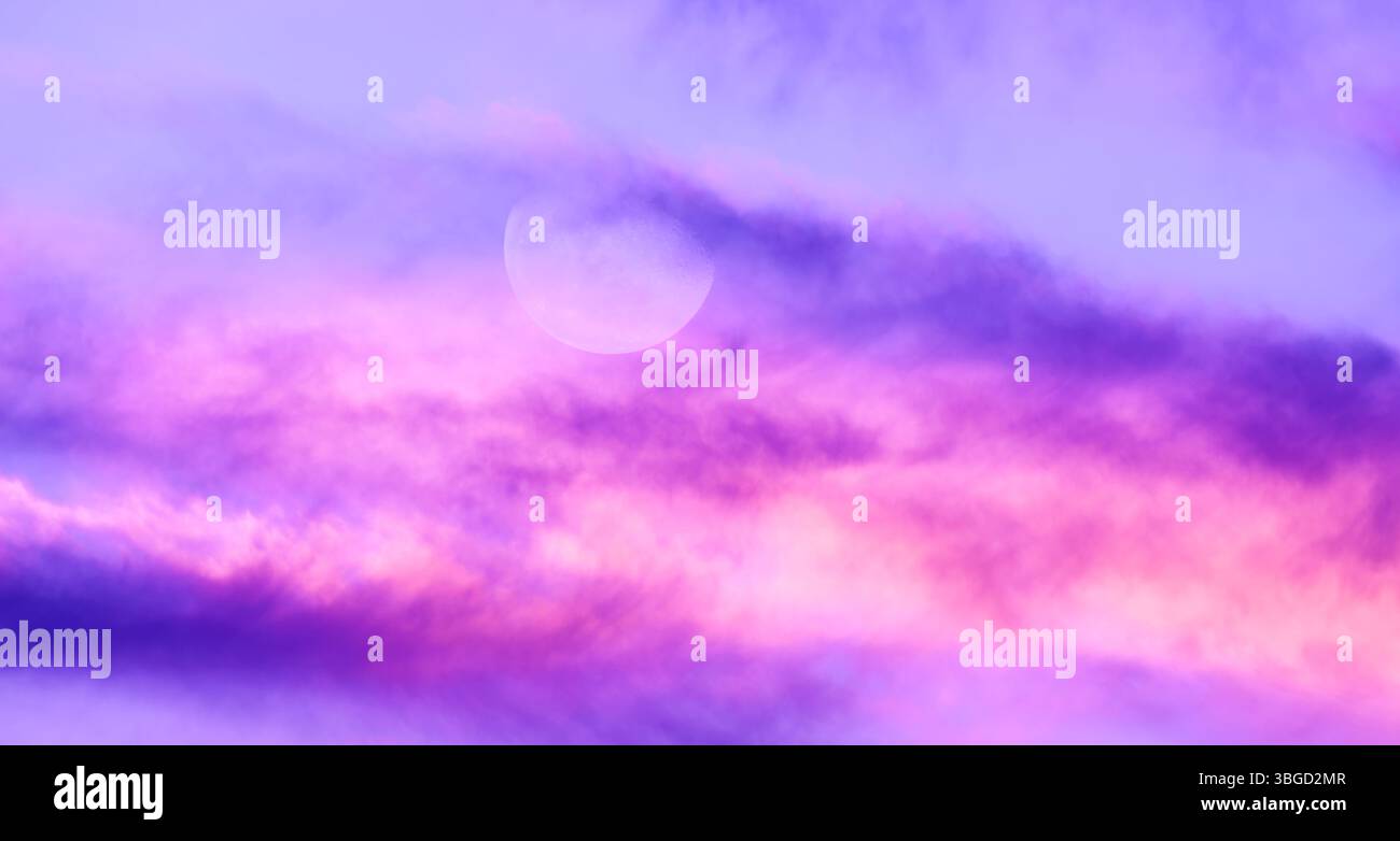 A Full Moon Against A Detailed Colorful Cloudscape Banner Header Stock Photo