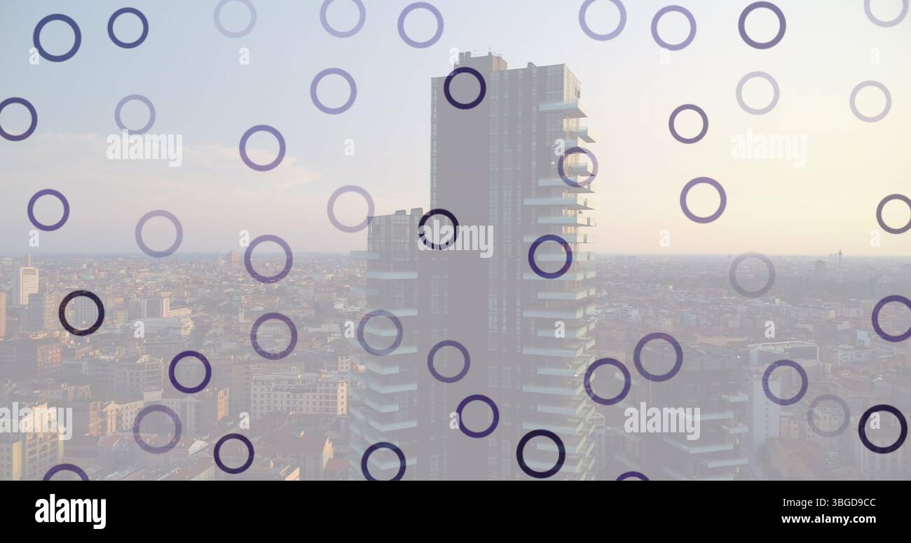 Image of falling circles over cityscape Stock Photo