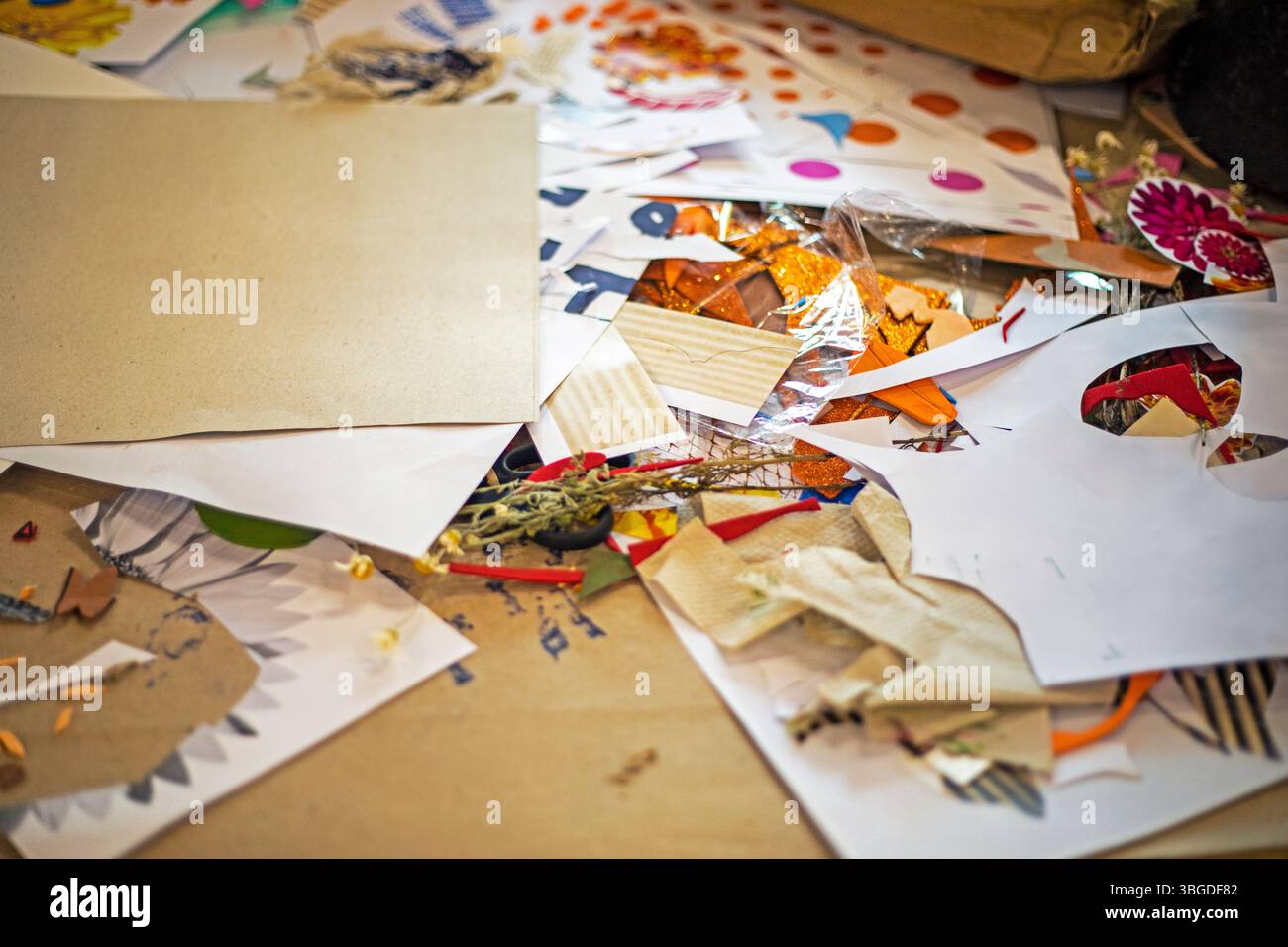 creative mess on the table while creating collages Stock Photo