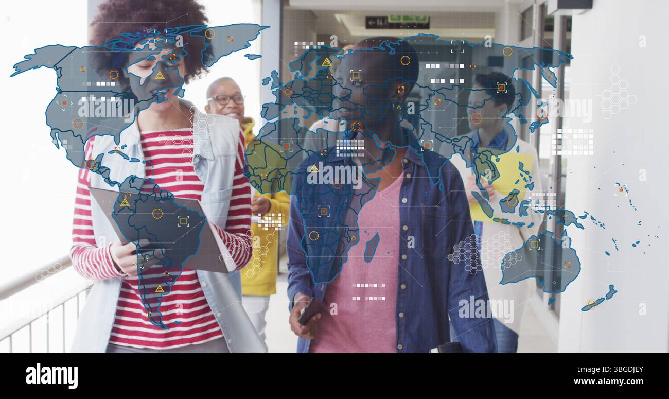Image of world map over diverse business people in office Stock Photo