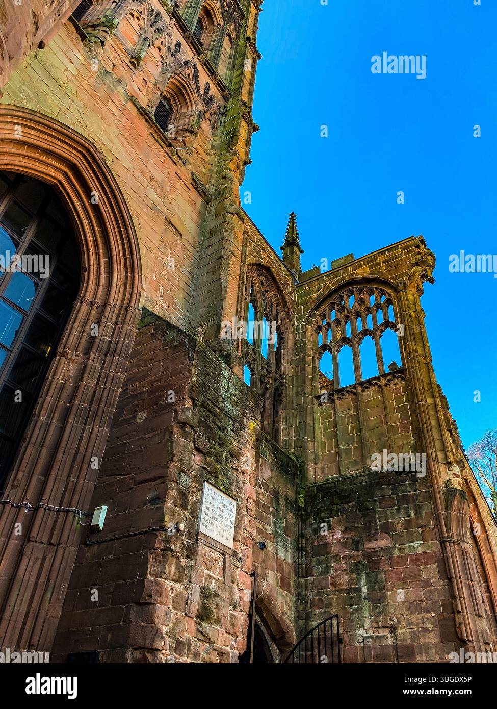 Historic Coventry Cathedral against a clear bright blue sky - Smartphone Captured Stock Image