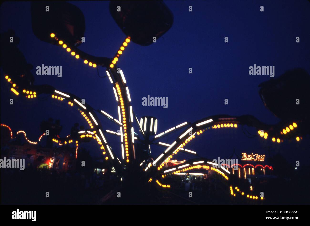The Octopus ride at the Ohio State Fair features six arms, each with ...