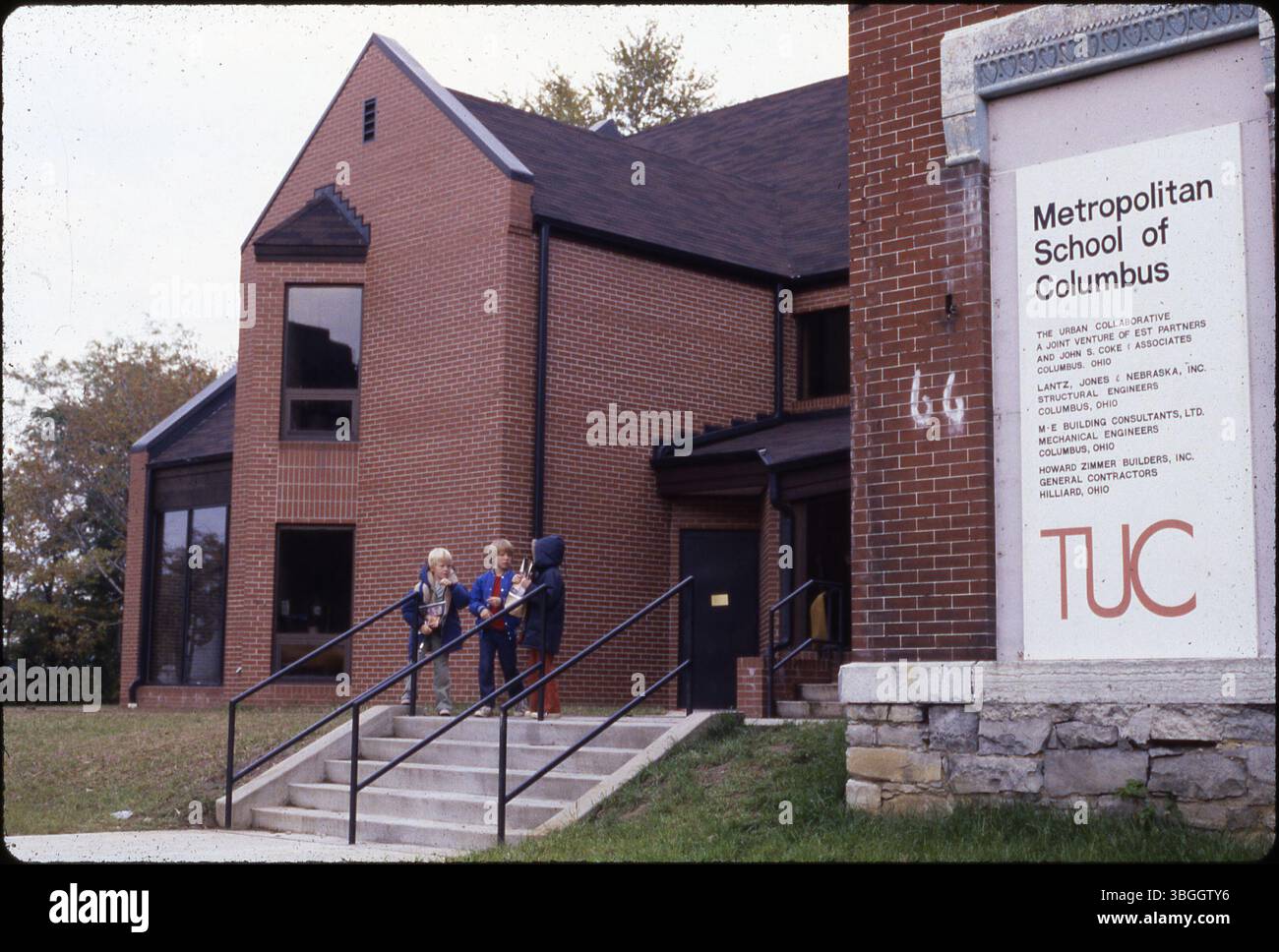 This circa 1980 image shows three children outside the Metropolitan