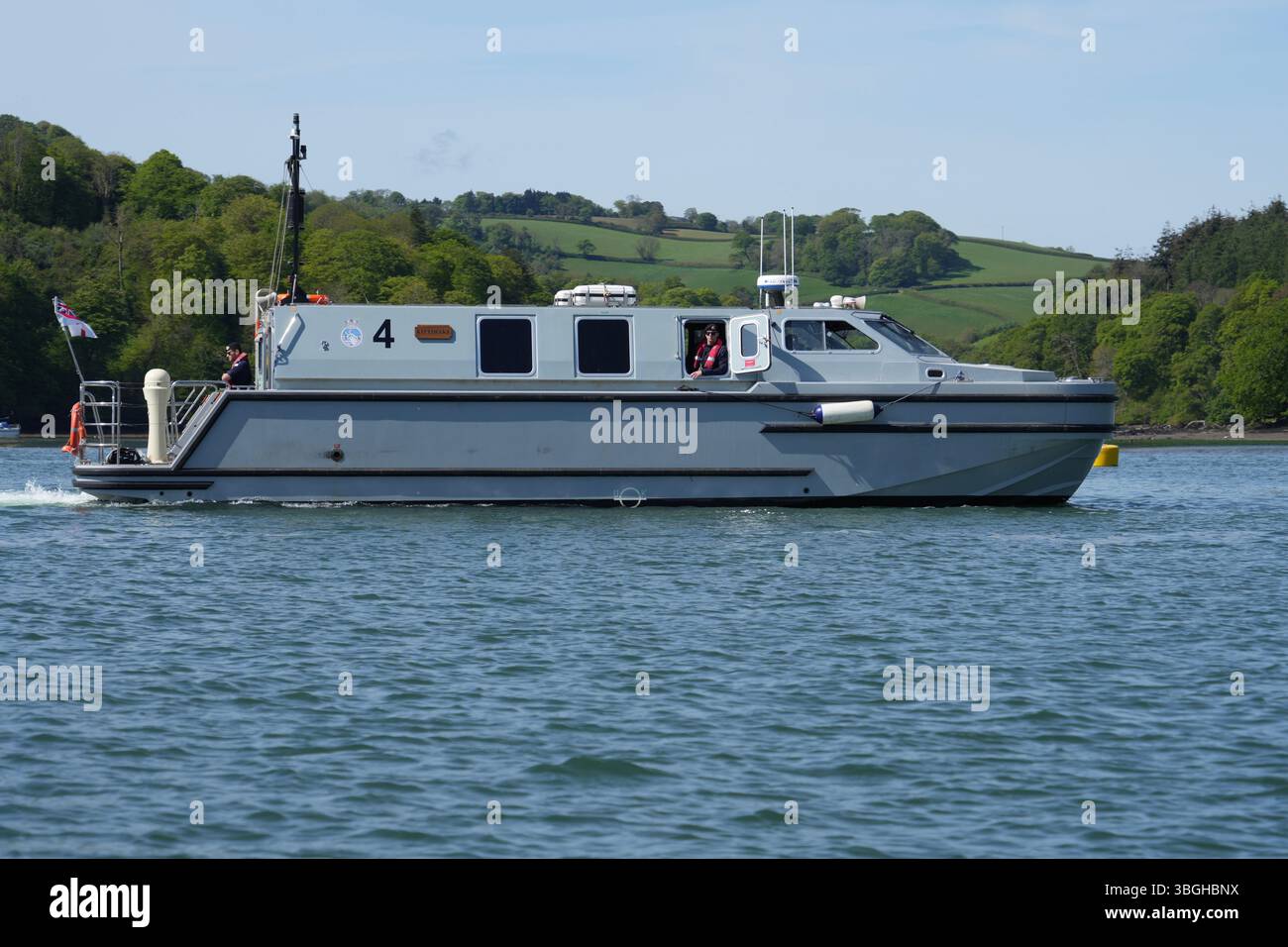 Royal Navy Sea Class Officer Training Boat Kittiwake cruising on The River Dart. Stock Photo