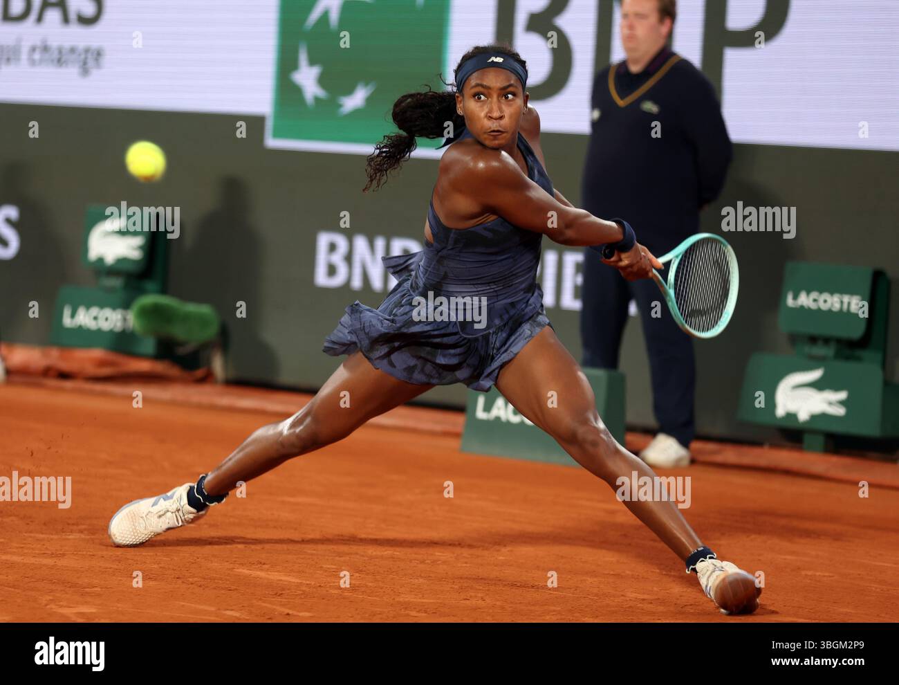 Coco Gauff of the U.S. plays against Lois Boisson of France during ...