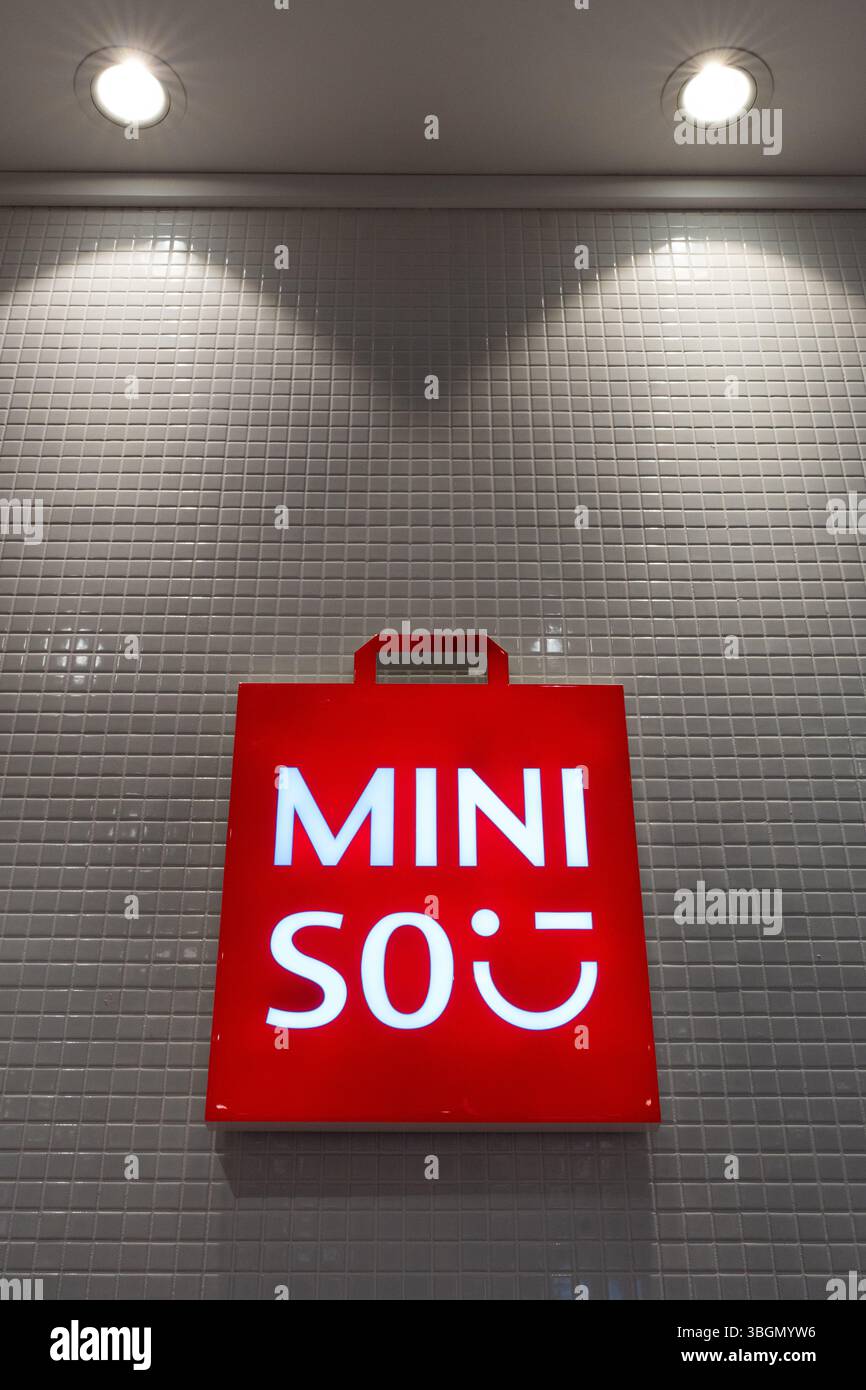 The signboard MINISO store. Miniso brand logo. Miniso signage on