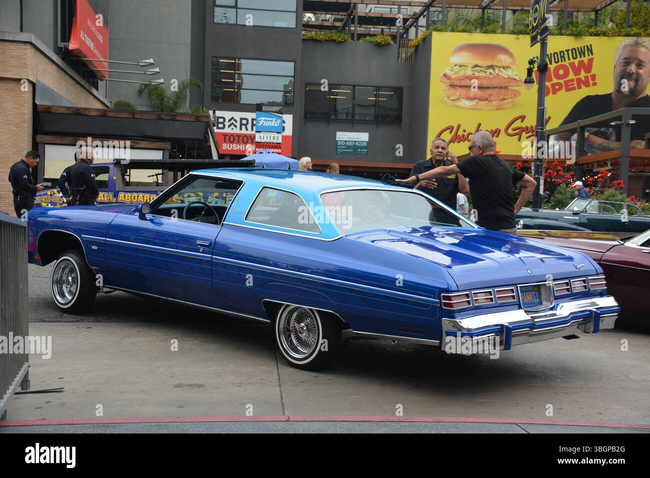 A customized 1976 Chevrolet Caprice lowrider displayed in