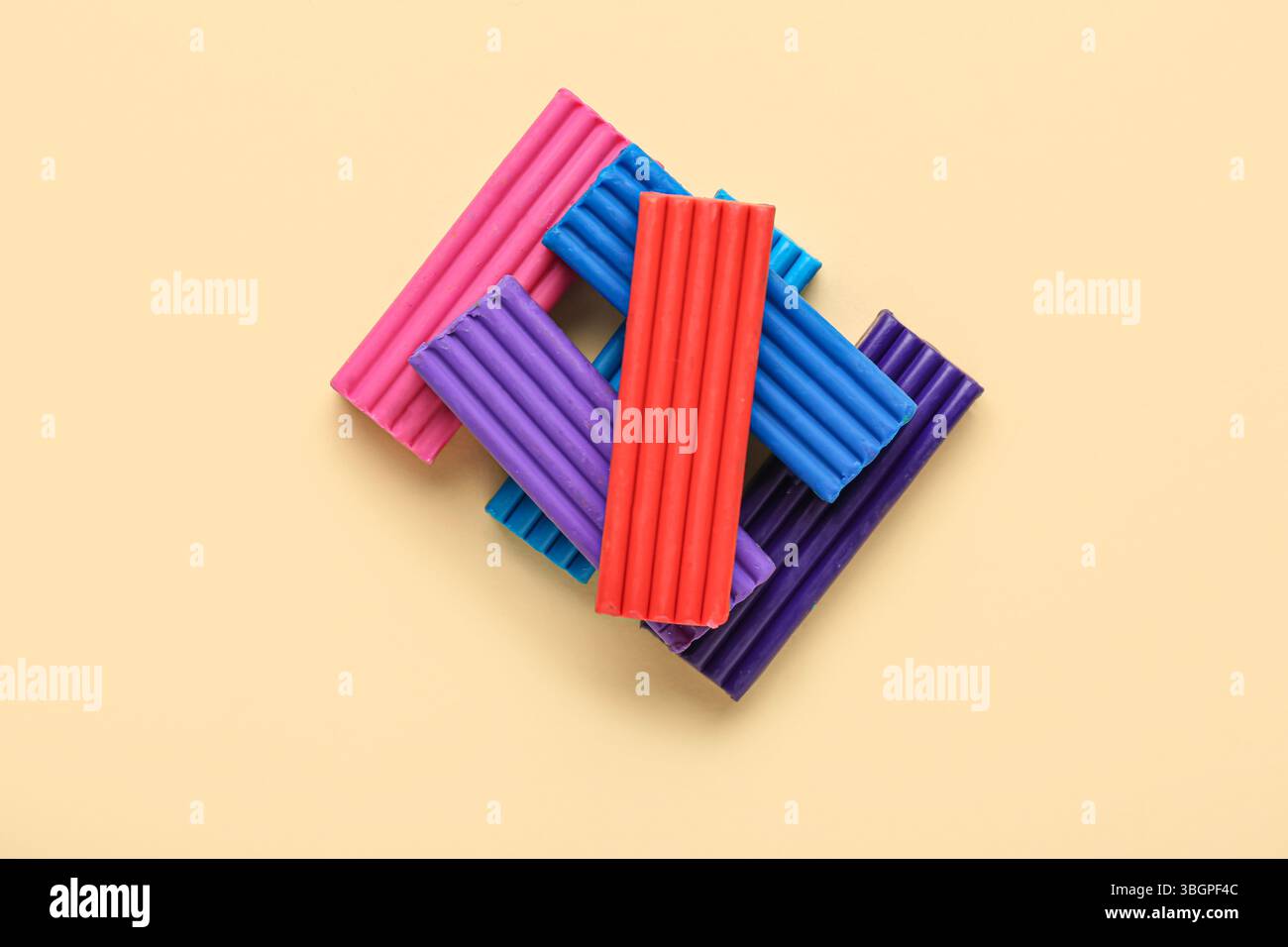 Colorful plasticine on beige background Stock Photo