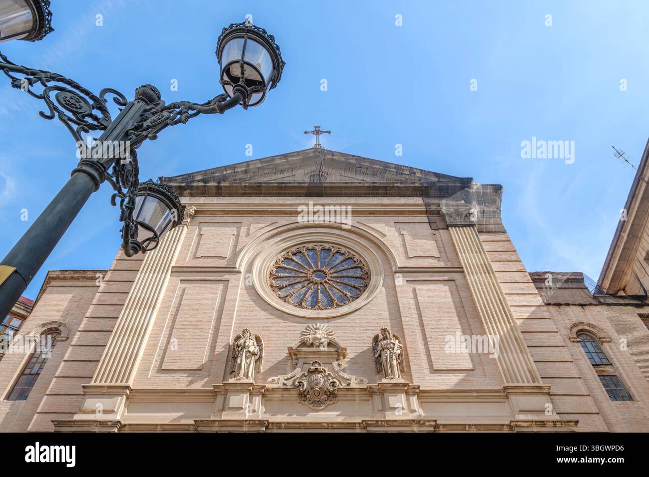 Grand Facade of Basilica del Sagrado Corazon de Jesus in Valencia Spain. Religious Architecture, Neo Gothic Style, Ornate Details, Clear Blue Sky Stock Photo