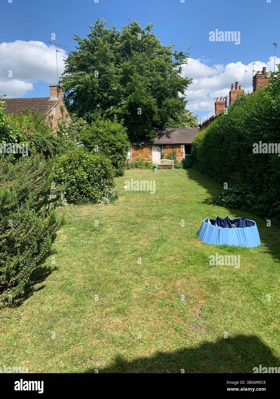 Cottage in Harpole Northampton Northamptonshire stone building small old history historic place building ancient residence Faulkner family home garden - Smartphone Captured Stock Image