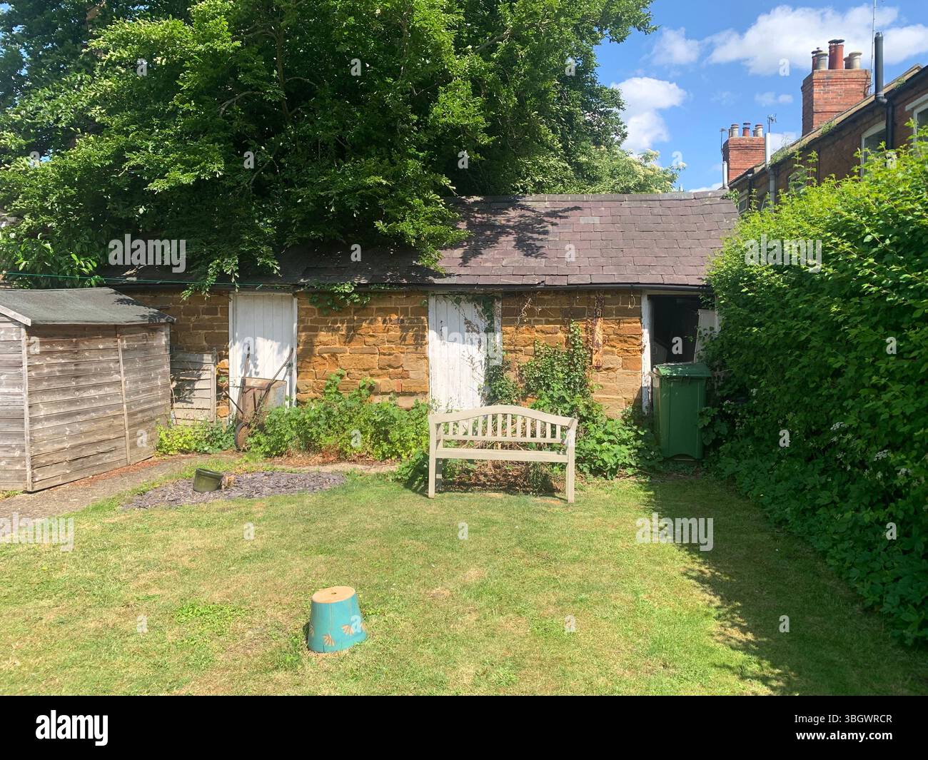 Cottage in Harpole Northampton Northamptonshire stone building small old history historic place building ancient residence Faulkner family home garden - Smartphone Captured Stock Image