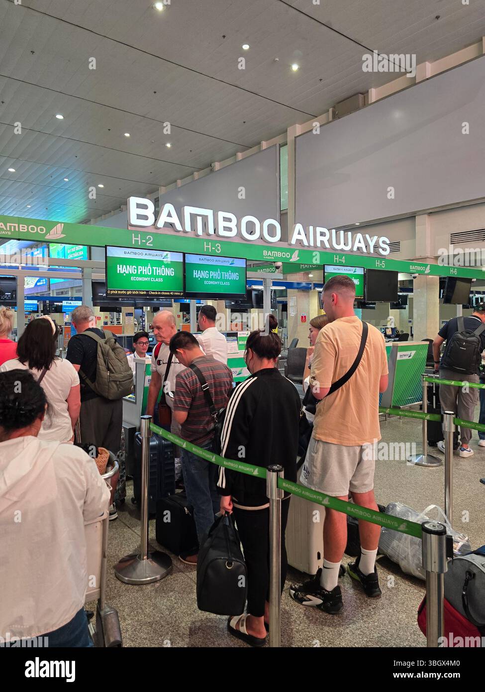 Hanoi, Vietnam - October 10, 2024: Check-in counter Of Bamboo Airways At Noi Bai International Airport In Hanoi Capital. - Smartphone Captured Stock Image