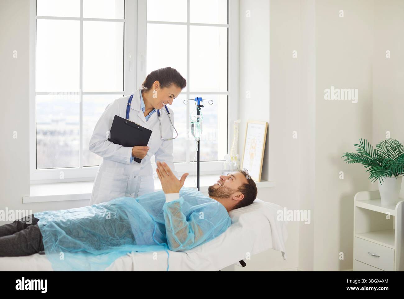 Happy doctor patient after good hi-res stock photography and images - Alamy