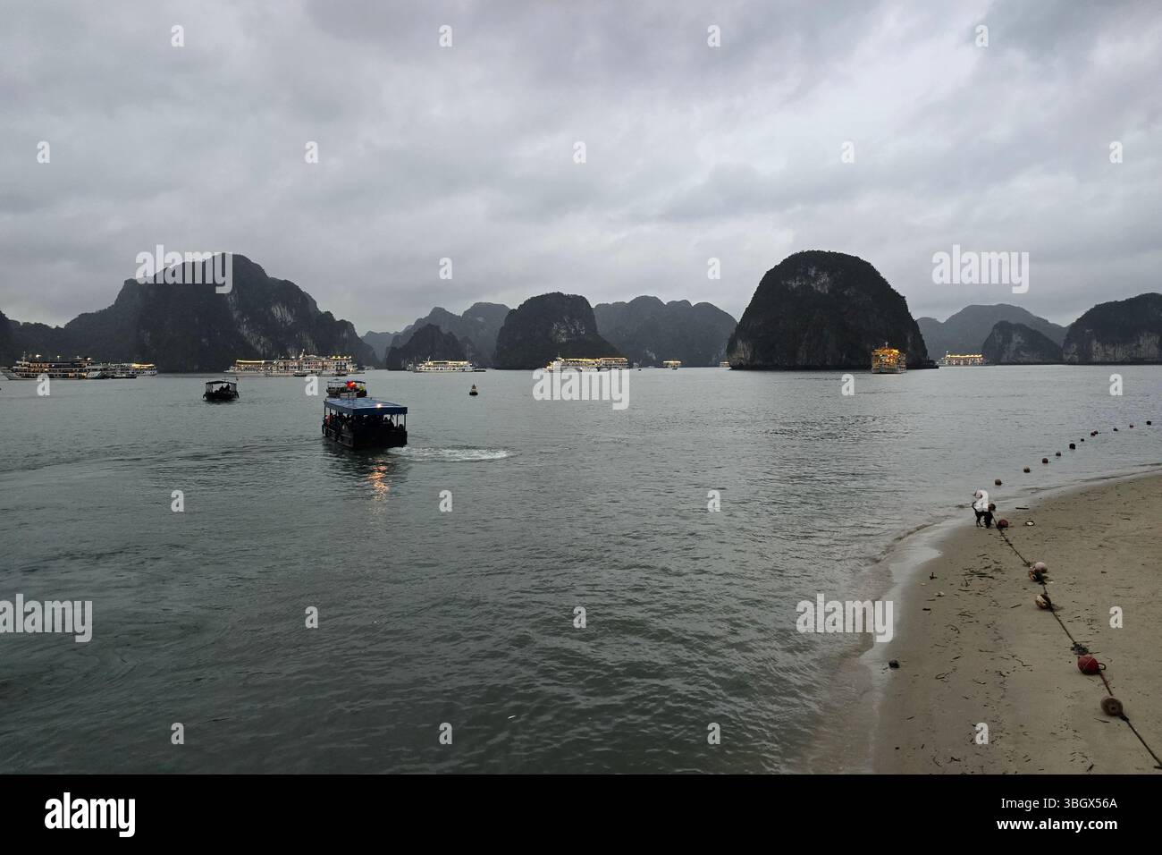 Halong Bay, Vietnam - October 10, 2024: Tourist ferry boat in Halong Bay, the  UNESCO world heritage site in Vietnam - Smartphone Captured Stock Image