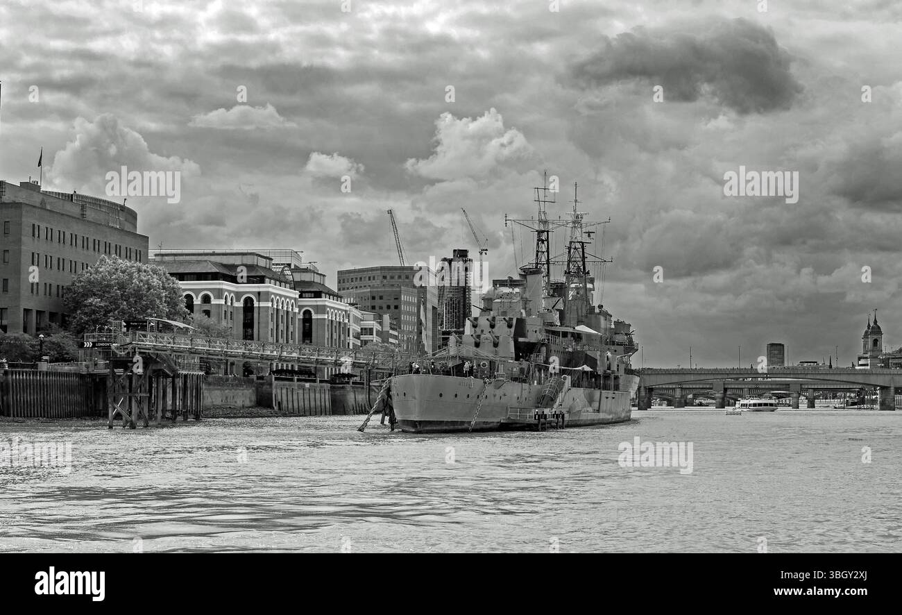HMS Belfast, London. Moored on the River Thames it was a Town-class light cruiser, once a working ship, but is now a museum open to the public Stock Photo