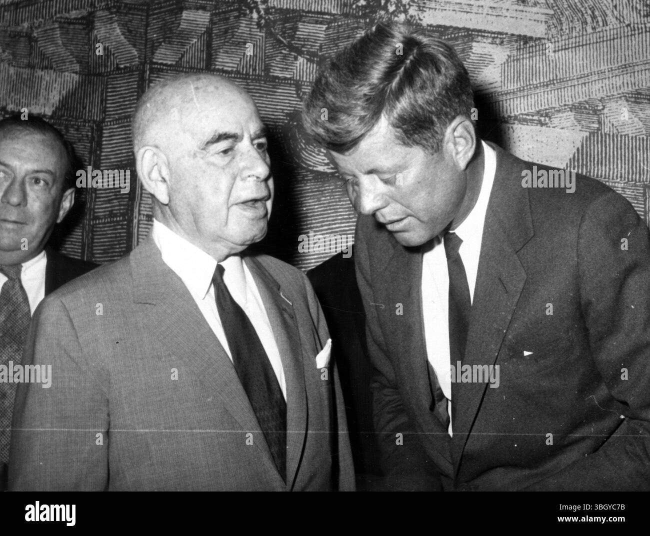 Senator John F. Kennedy (right) listens as former governor and senator Herbert H. Lehman talked to him at the Park Sheraton Hotel. 12 October 1960 Stock Photo