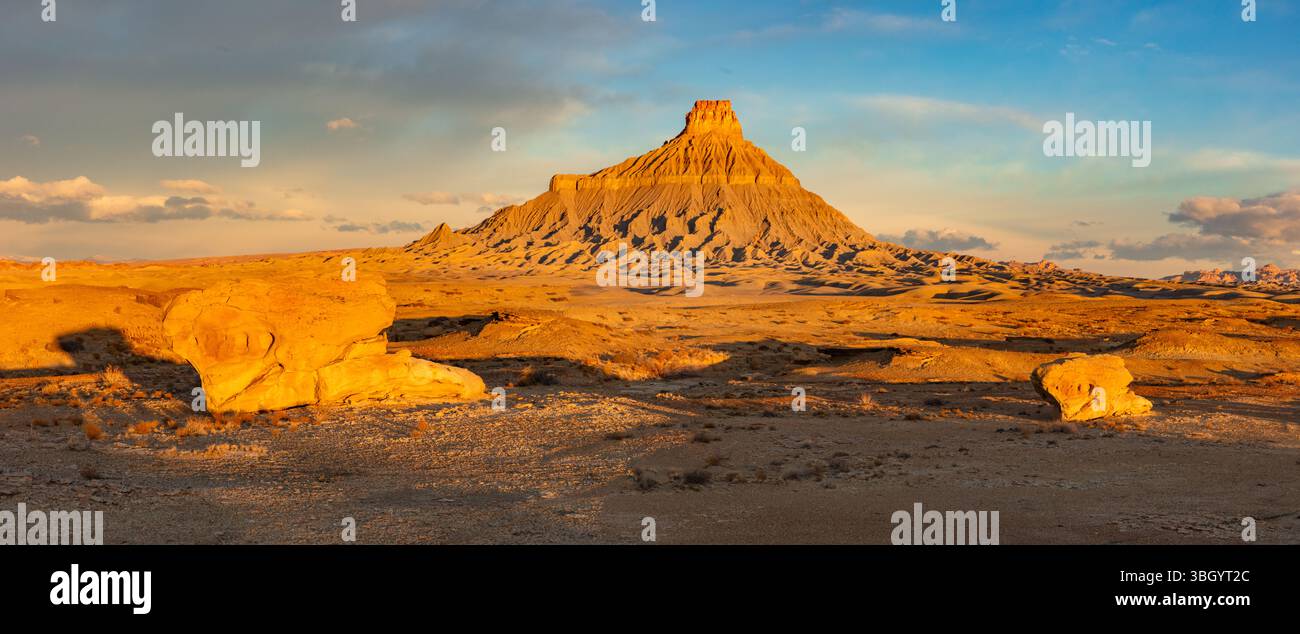 Two Similat Rocks Rising above two eerily similar rock formations and the Utah badlands ...