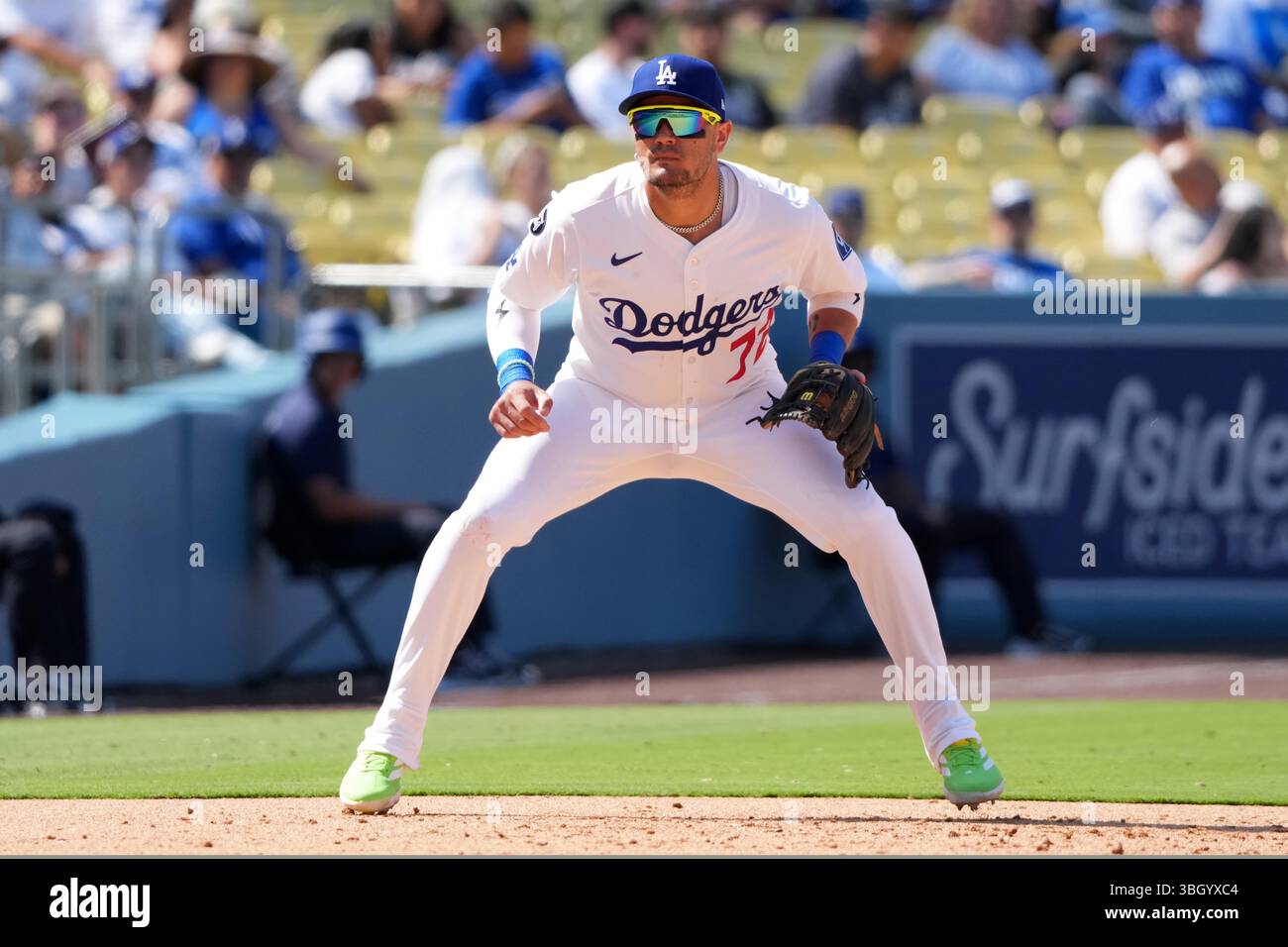 Los Angeles Dodgers hitting coach Mark McGwire looks into