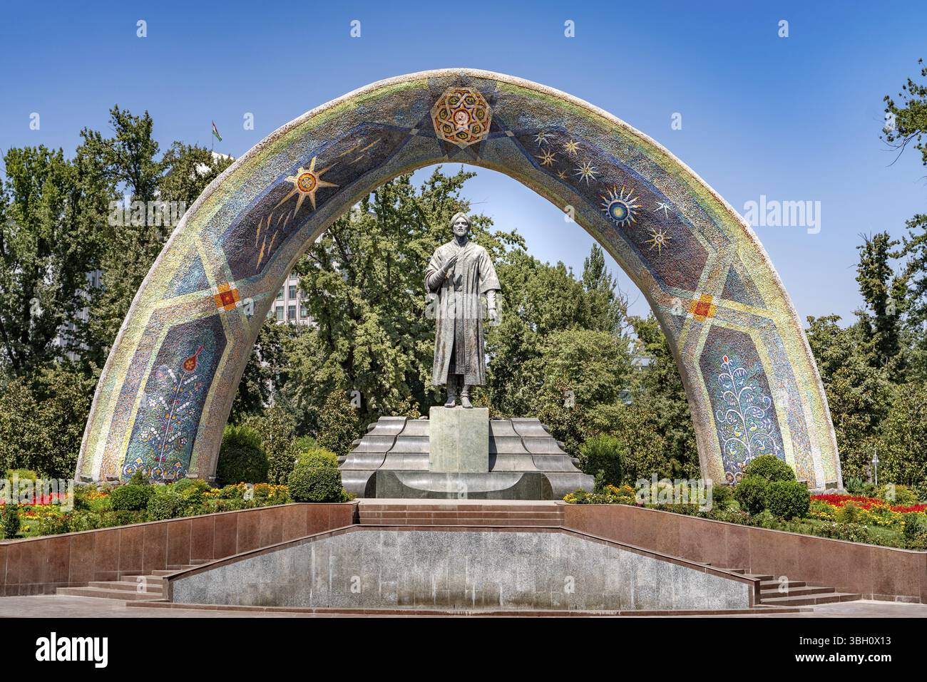 The arched Monument to Rudaki in Rudaki Park in Dushanbe Stock Photo ...