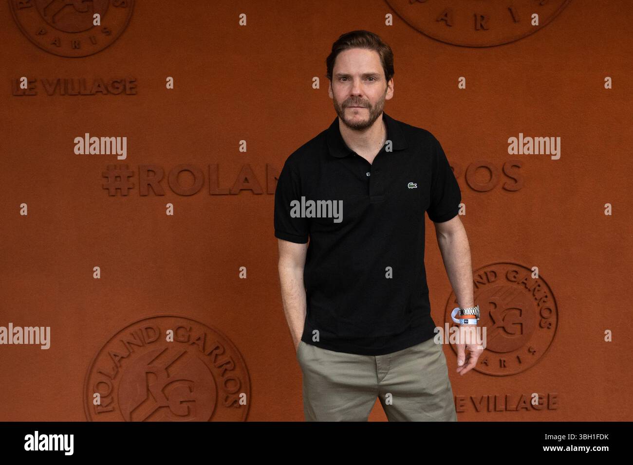 Daniel Bruhl take a pose at Roland Garros for the French open on June 6,  2025, in Paris, France. Photo by Laurent Zabulon/ABACAPRESS.COM Credit:  Abaca Press/Alamy Live News Stock Photo - Alamy, image size:1300x956