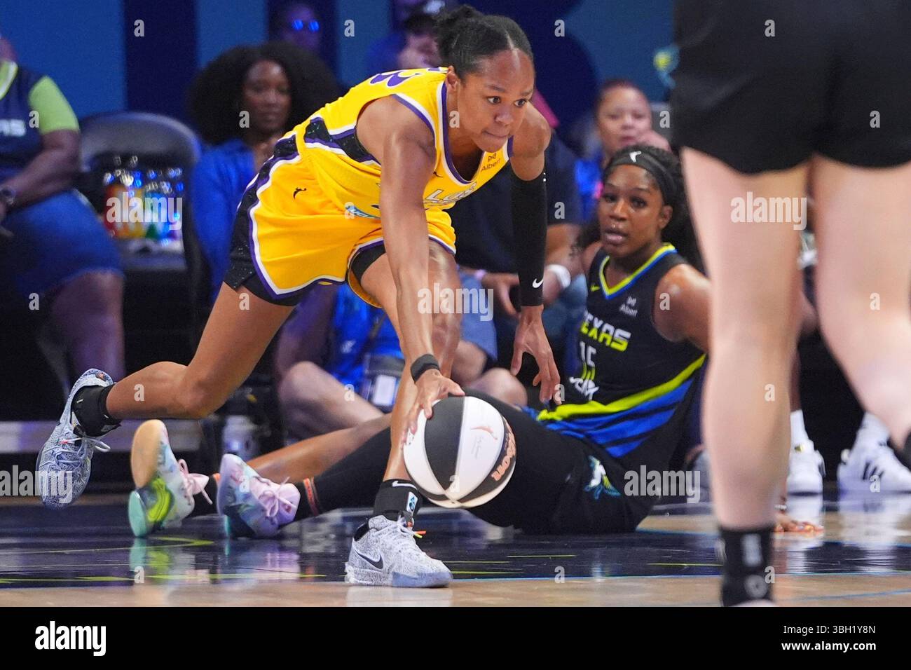 Los Angeles Sparks forward Azura Stevens (23) comes up with the loose ...