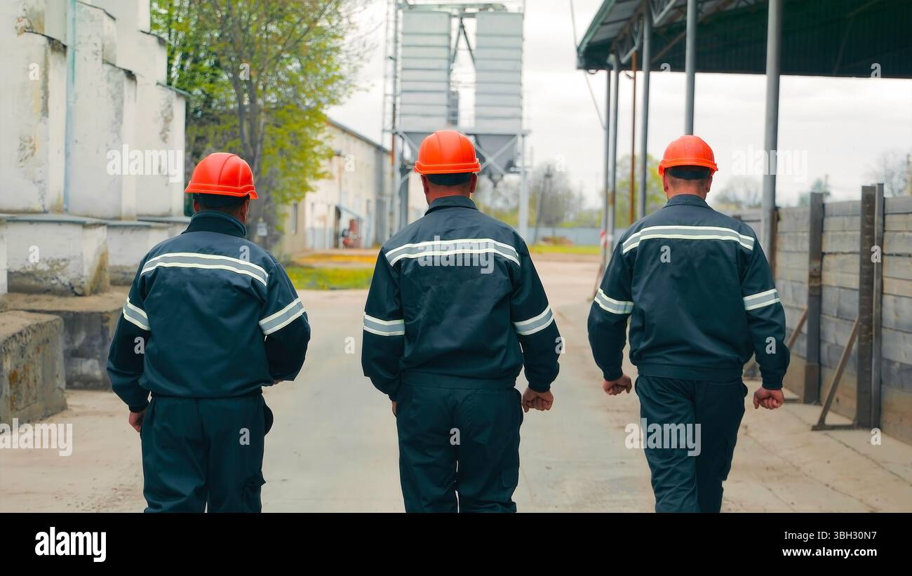 Construction workers wearing orange hi-res stock photography and images ...