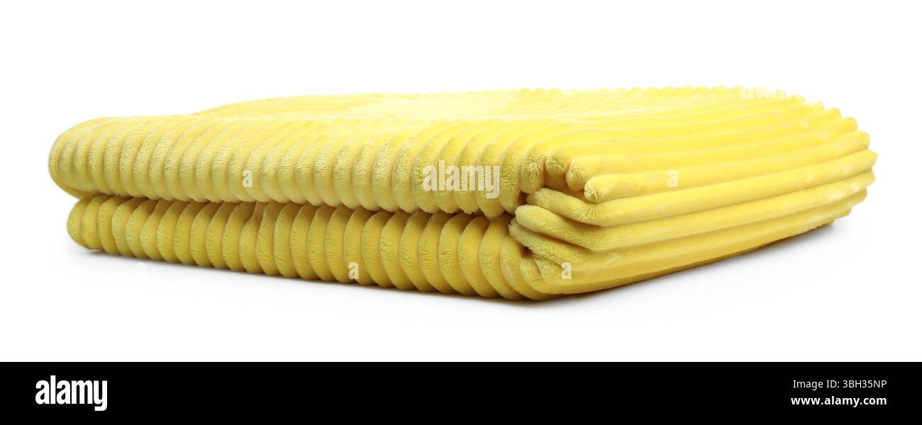 Folded yellow woolen blanket isolated on white Stock Photo