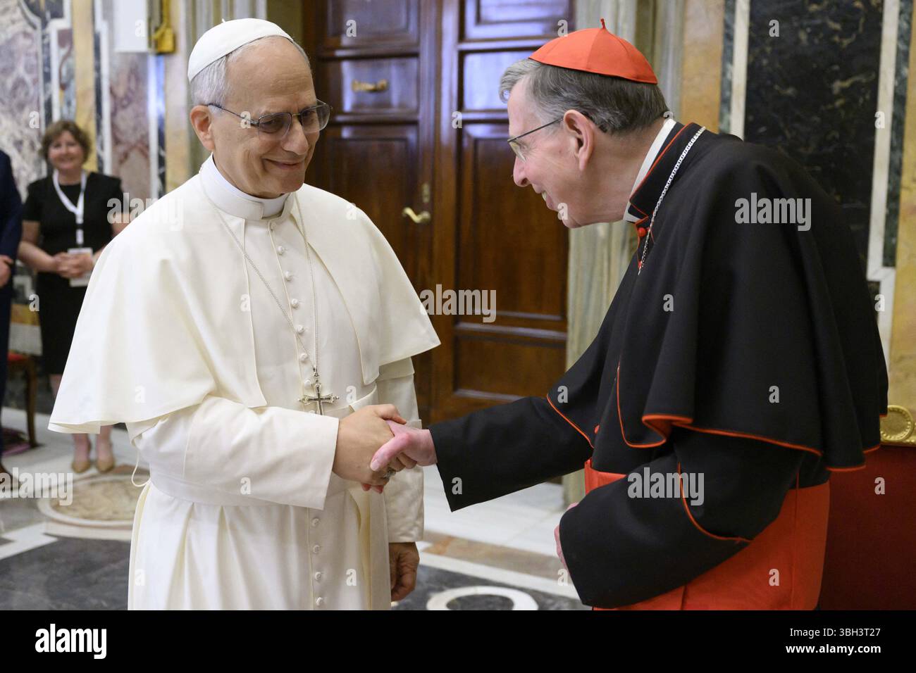 Pope Leo XIV greets cardinal Kurt Koch, president of the Dicastery for ...
