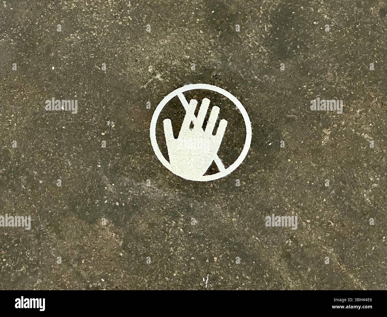 Do not touch icon with a hand Stock Photo