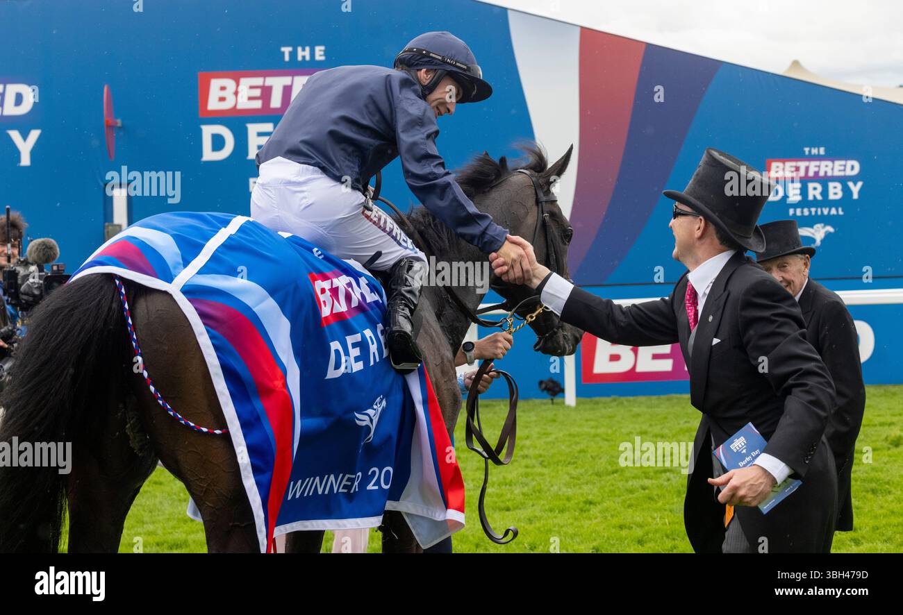 Epsom, UK 7 June 2025 Trainer Aidan O'Brien shakes Wayne Jordan’s hand ...