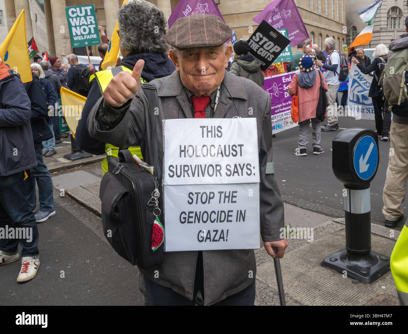 London, UK. Holocaust Survivor Stephen Kapos says 'Stop The Genocide in Gaza'. Several thousand march from the BBC to Whitehall against the government spending more on arms while cutting public services, the NHS and benefits for the disabled - they say is a blueprint for arms manufacturers to print money based on a false narrative. They demand Welfare not Warfare and call for taxes on the rich, cutting down tax avoidance and evasion and an end to cuts. Peter Marshall/Alamy Live News Stock Photo