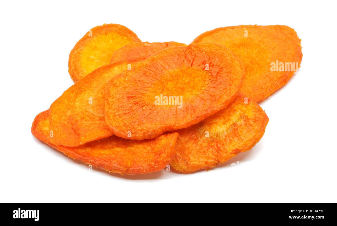 Dried carrot chips portion on a white background. Stock Photo