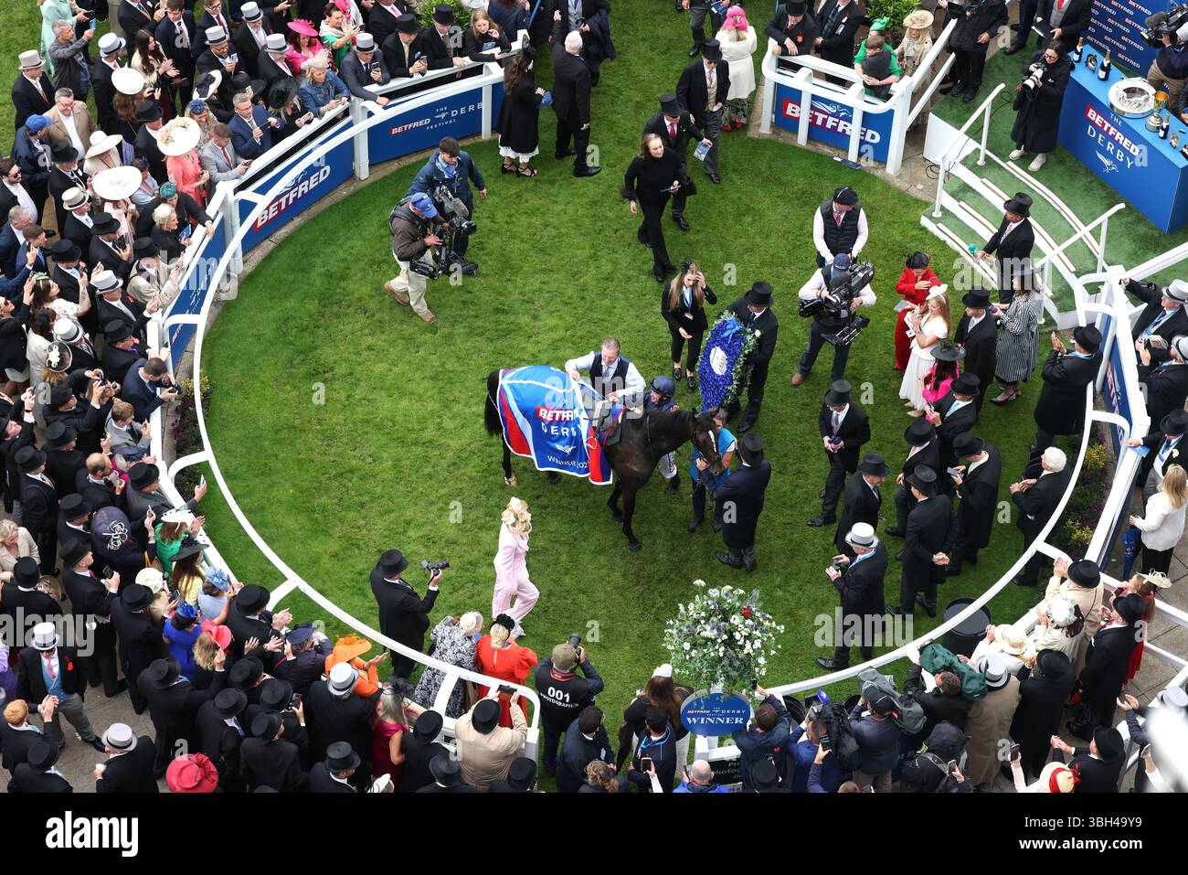 Lambourn ridden by Wayne Lordan enter the parade ring after winning the ...