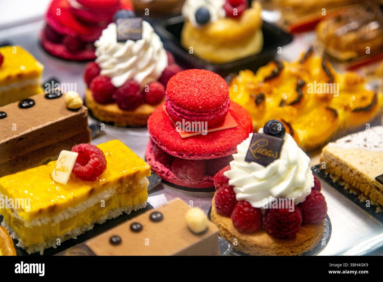 Colourful cakes and macarons at Lucas Patisserie in Bayonne, Basque Country, France Stock Photo