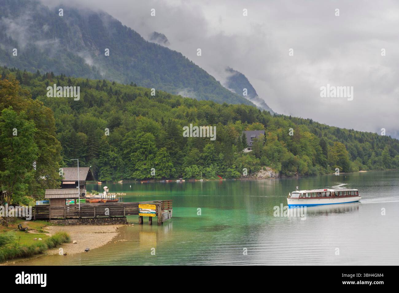 Mountains with lake and boat hi-res stock photography and images - Alamy