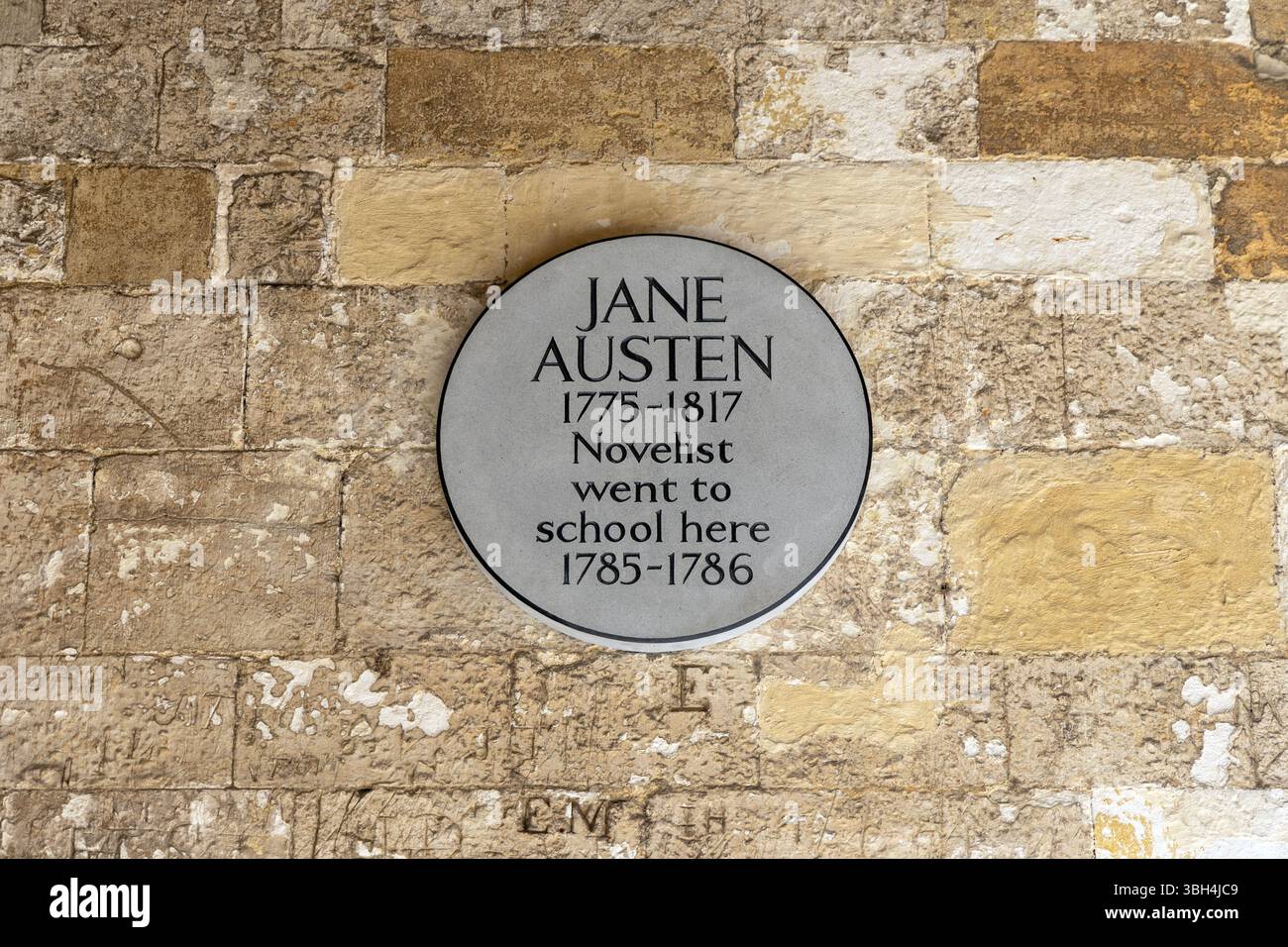 Plaque for Jane Austen's school location inside the Reading Abbey Gateway, Reading, Berkshire, England Stock Photo