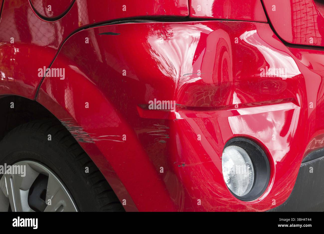 Accident damage to the rear of a car Stock Photo - Alamy