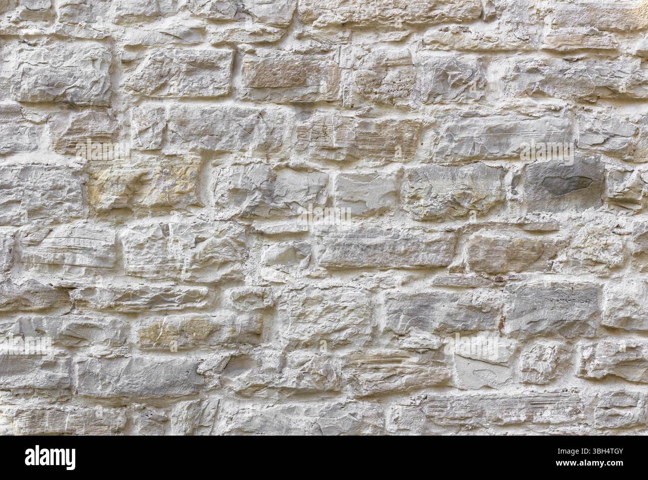 Texture of wall. Medieval wall made from bumpy stones Stock Photo