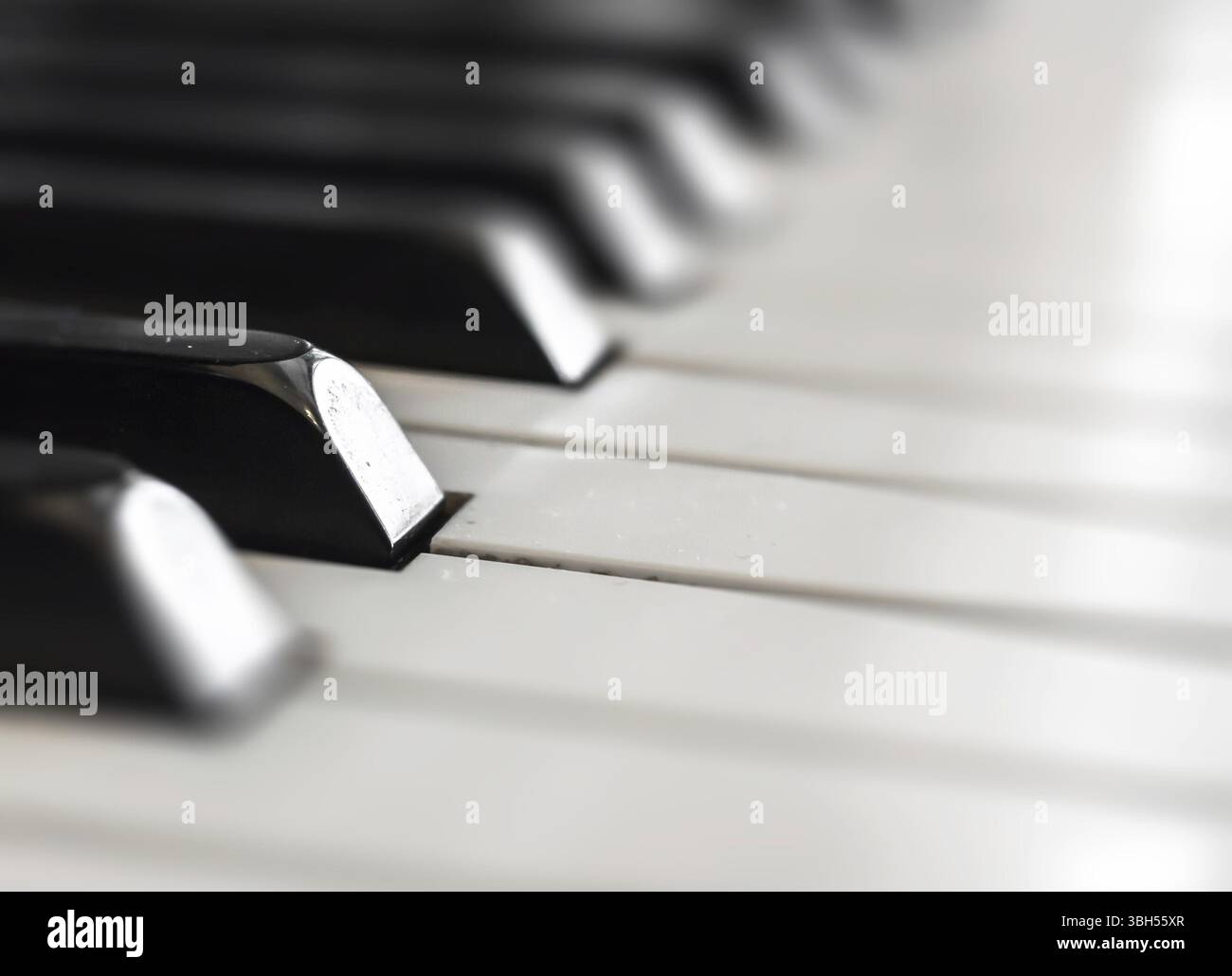 Piano keyboard background with selective focus. Space for text Stock Photo