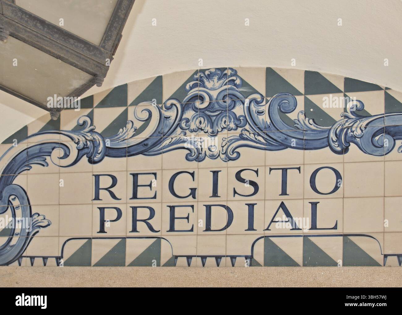 Tiled facade with the inscription Registo Predial, Land Registry of Evora, Alentejo - Portugal Stock Photo