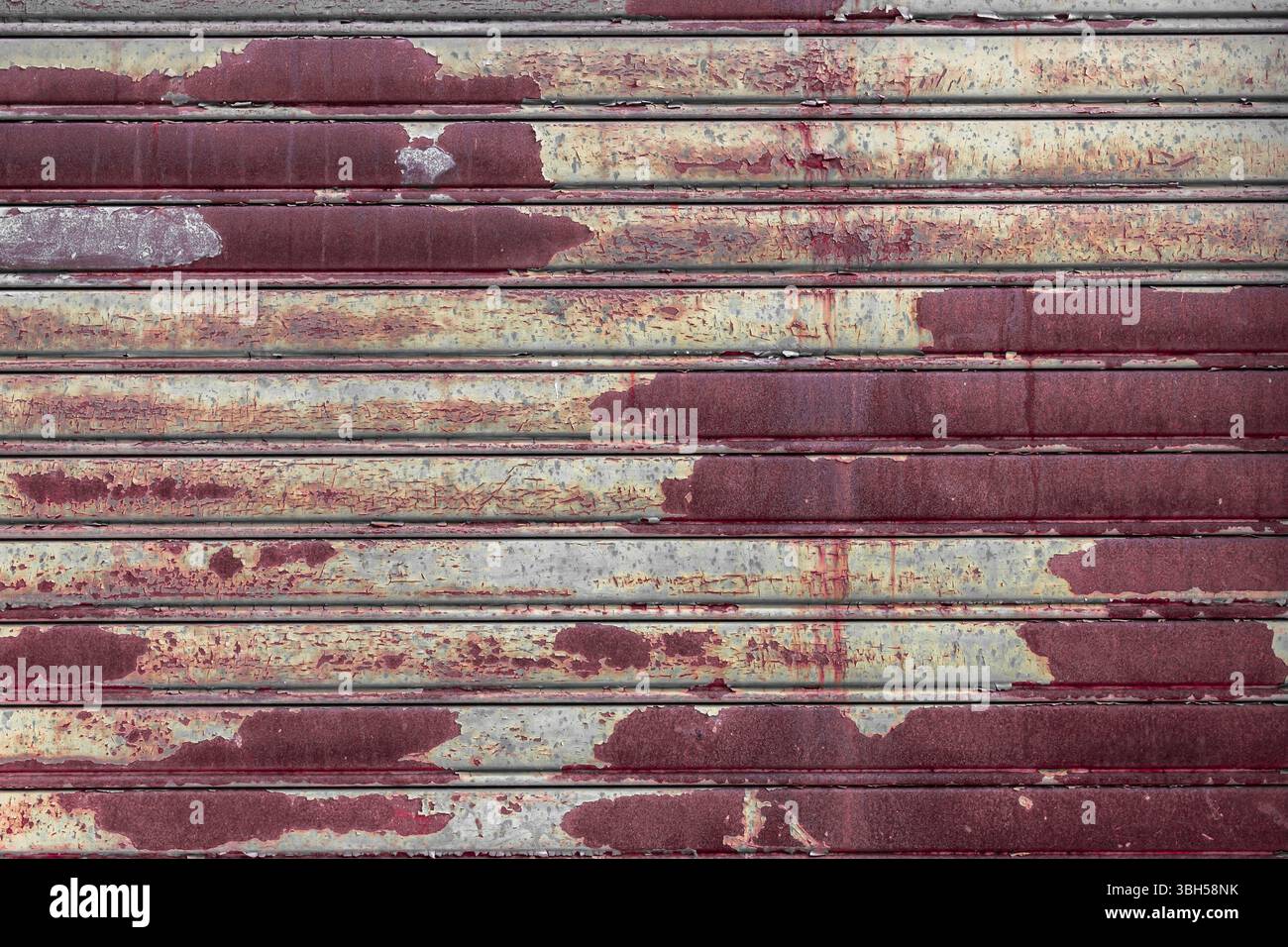 Roller shutter door, rusty metal background Stock Photo