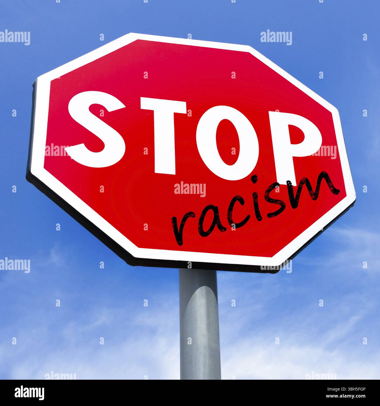 Stop Rascism Sign Red stop Racism sign on sky background. Design concept against racism ...
