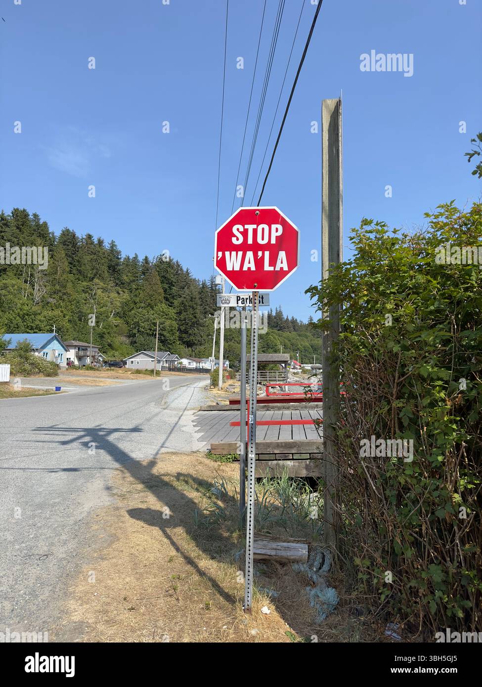 Multilingual road traffic stop sign in English and Kwak'wala-speaking ...