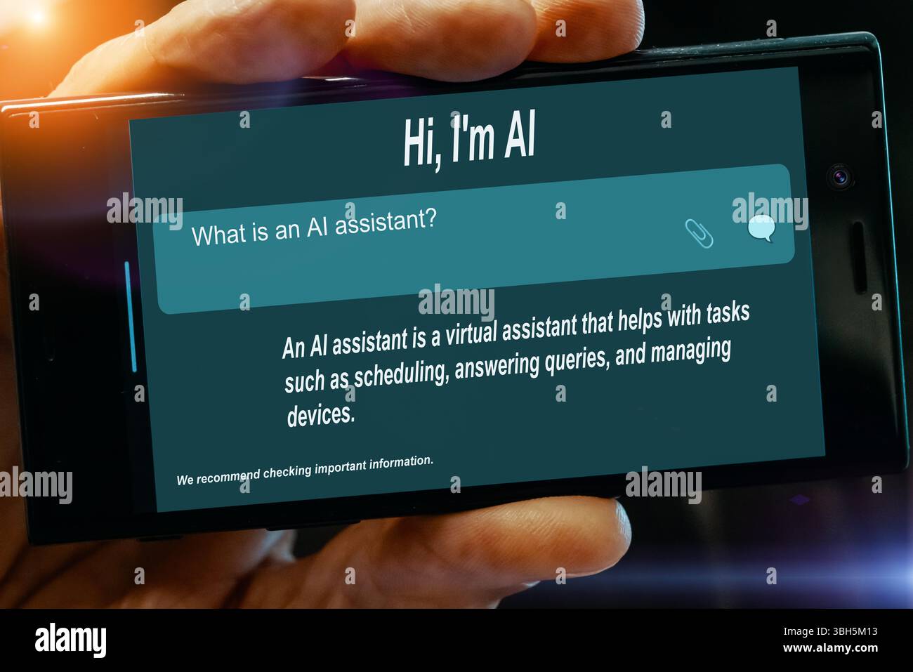 Question for AI on tablet screen. What is an. AI assistant? Stock Photo