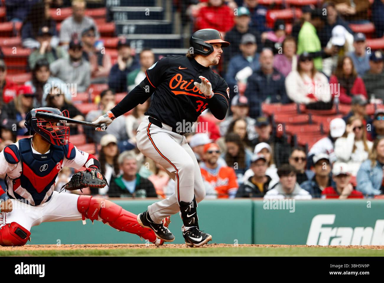 Baltimore Orioles' Adley Rutschman follows through on a hit against the