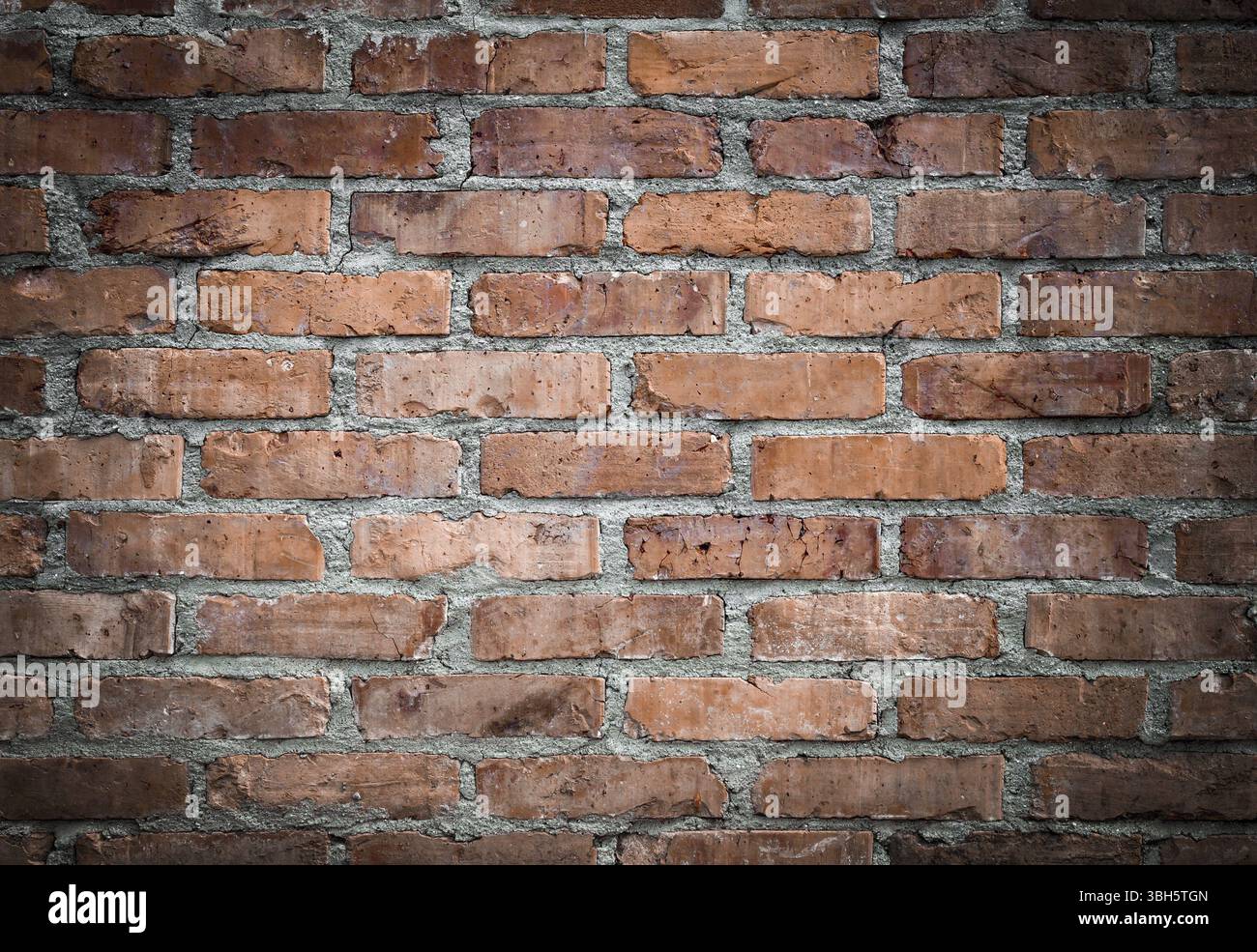 Orange old worn brick wall texture background. Vintage effect Stock Photo