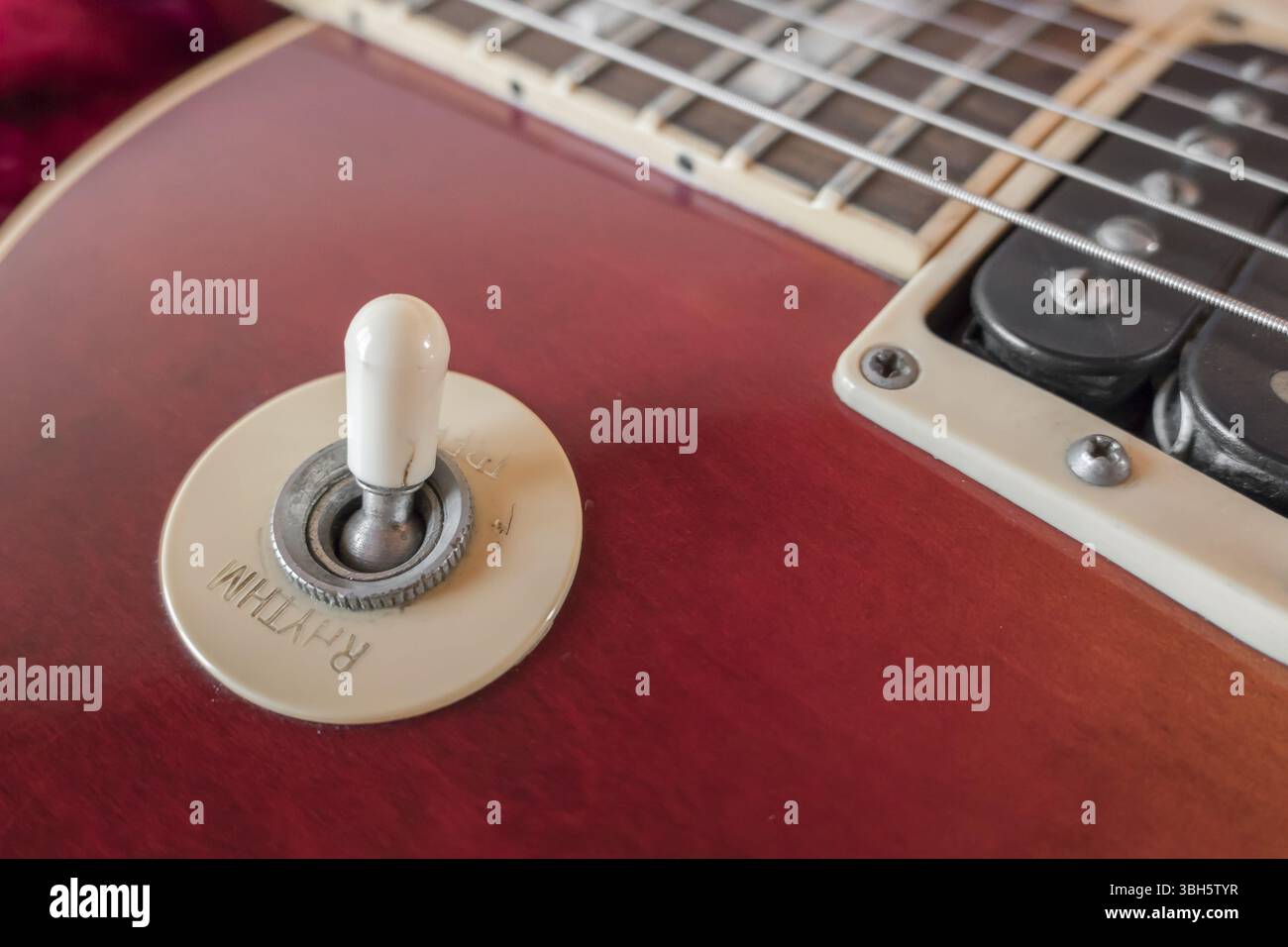 Rhythm and Treble mode pickup selector switch. Close - up of pickup selector switch on a vintage electric guitar Stock Photo