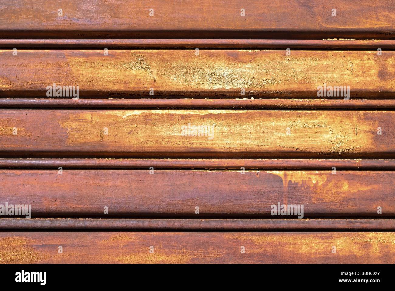 Rusty metal shutter gate. Grungy background texture Stock Photo