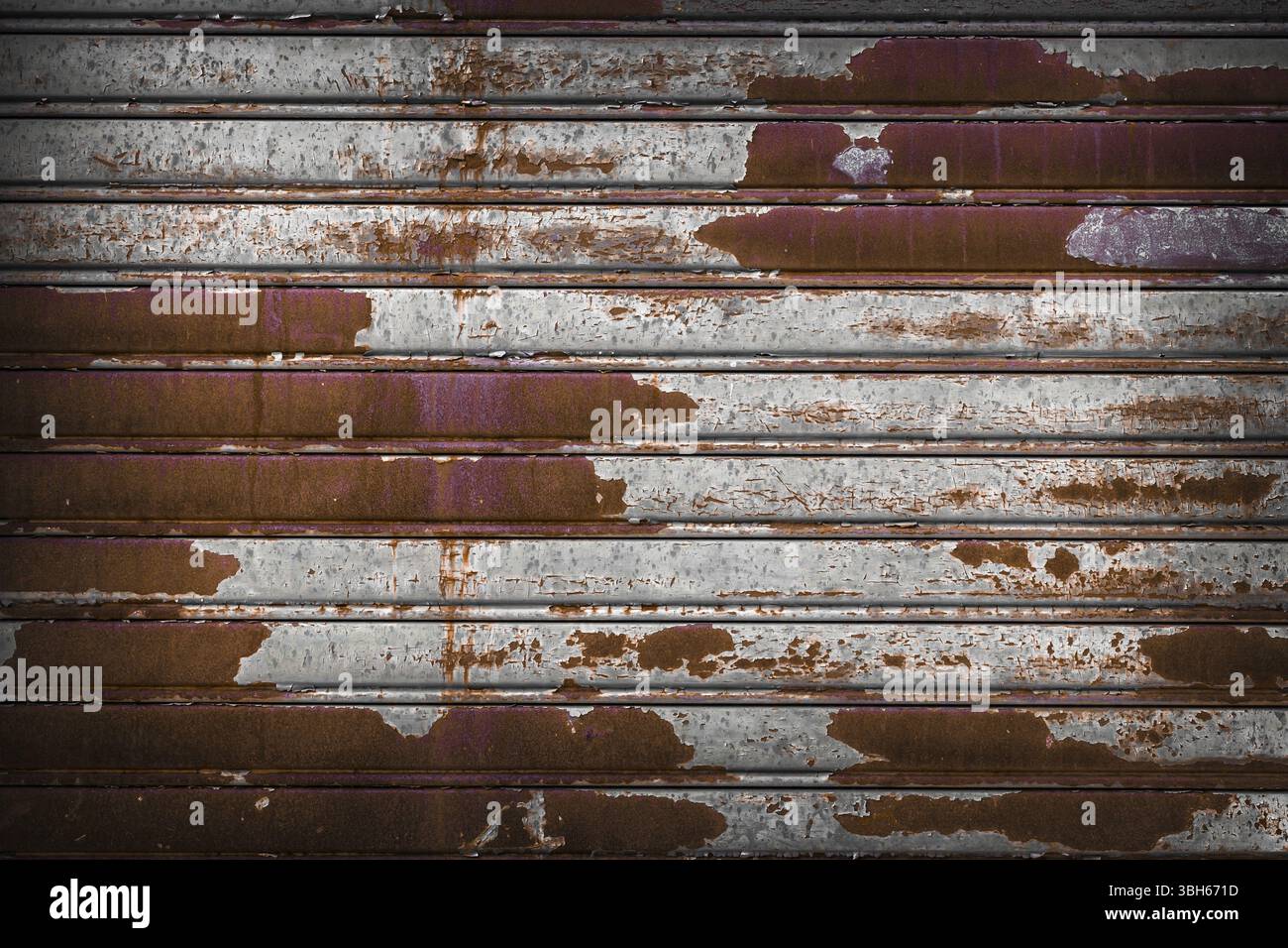 Roller shutter door, rusty metal background Stock Photo
